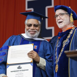 Dr. Lonnie Bunch III receives his honorary degree from President Timothy Killeen